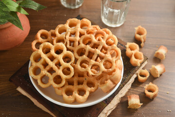 Rose Cookies or Achu Murruku Achappam  achapum, puvvulu, rosette cookie Anglo Indian cookie Indian Christians christmas, rice flour,   Kerala South India Traditional Malaysian, Indonesian and Brunei 