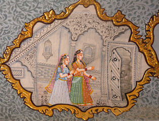 Honorable Indian woman in dressing room - ancient wall painting of Patwon Ki Haveli in Jaisalmer, Rajasthan, India. A haveli is a traditional townhouse or mansion in India.