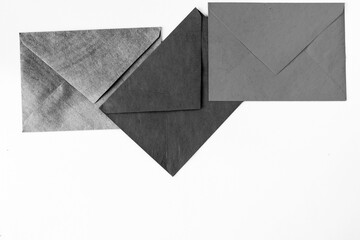 Three envelope on the white background, black and white