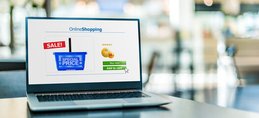Laptop computer displaying an online shopping website