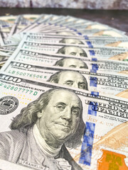 100 Dollars bill and portrait Benjamin Franklin on USA money banknote. Close up of one hundred...