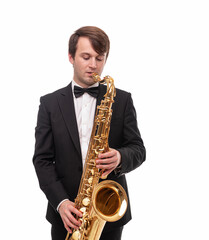 Naklejka premium Saxophonist with a saxophone in his hands on a white background.