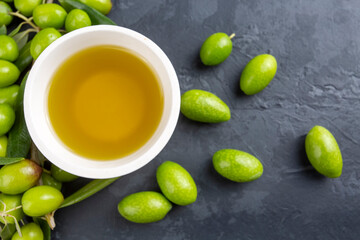 Green fresh olive and olive oil