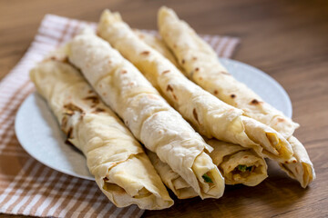 Traditional, local Turkish food; cheese pastry wrap (Turkish name; Sikma)