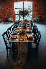 Banquet table decorated with natural materials