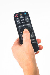 hand holding a remote control on white background, close-up