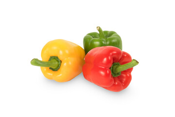 Red, green and yellow bell peppers isolated on white background.