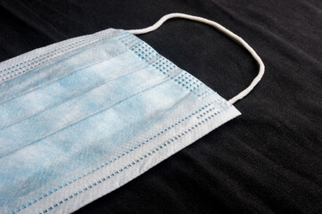 Background concept for news about the novel coronavirus COVID-19 pandemic, antiviral medical mask...