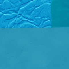 Blue torn paper collage close-up. Texture made from various paper and cardboard parts. Damaged old paper background. Vintage blank wallpaper. Material design backdrop.