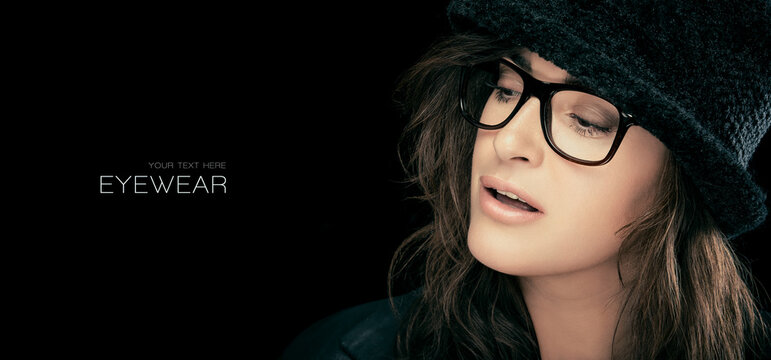 Chic stylish young woman in modern glasses. Ophthalmology and eye care concept