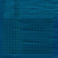 Blue torn paper collage close-up. Texture made from various paper and cardboard parts. Damaged old paper background. Vintage blank wallpaper. Material design backdrop.