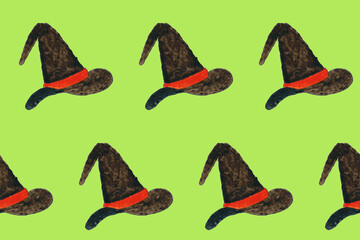 Seamless pattern with watercolor witch hat on green board. Design element for Halloween. Symbol of witchcraft. Magician or wizard hat. Print for textile, greeting cards, wrapping paper, decor, design