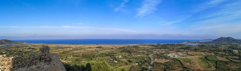 Fototapeta na wymiar Ultra wide panorama of the coast line of Posada and Siniscola in Sardinia