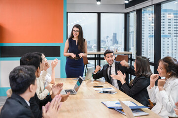 Multiethnic business meeting of colleagues and executive with happy and enjoying in modern office