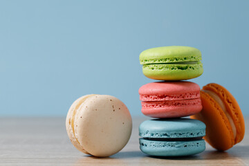 Cake macaron or macaroons on pastel background with copy space, Sweet and colorful dessert