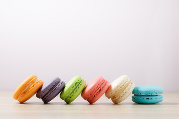 Cake macaron or macaroons on pastel background with copy space, Sweet and colorful dessert