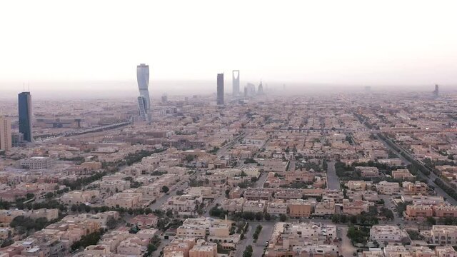 Skyline of Riyadh, SAUDI ARABIA along King Fahd Road highway in the morning / 4K