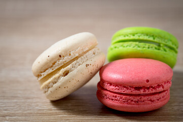 Close up cake macaron or macaroon on wooden background , Sweet dessert