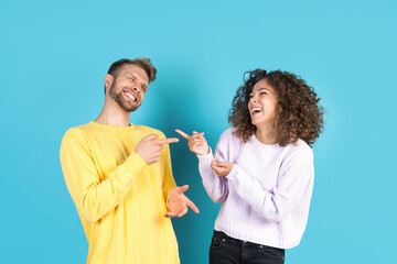 Two mixed race people on blue background