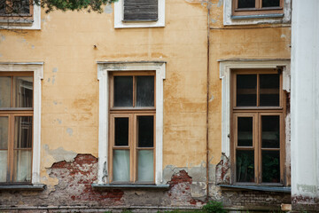 Fototapeta na wymiar Windows of historical building