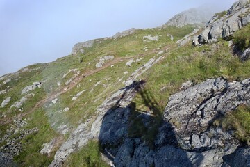 mountain landscape with gondola shadow