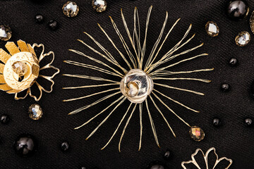 Golden star of threads and metal details