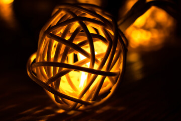 Christmas lights close up photo. Cozy mood in the evening. Festive time.
