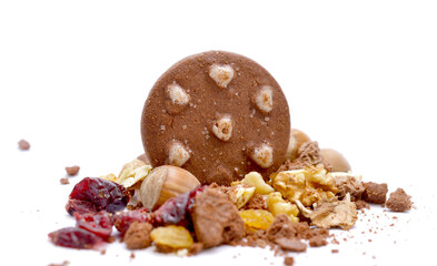 Chocolate cookies  , nuts , cranberrries and raisins, isolated on white background