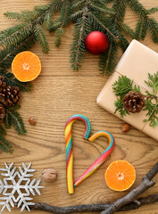 Christmas holidays composition on a wooden background.