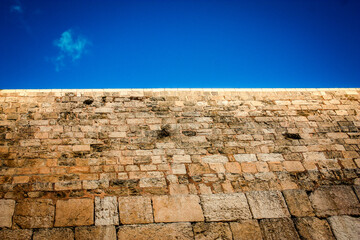 Close up of The Western Wall, Wailing Wall, often shortened to The Kotel is the most religious site...