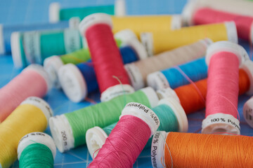 close up of sewing cotton in different colors