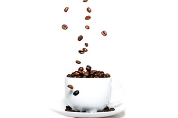 Roasted coffee beans falling into a coffee cup on a saucer with a white background, close-up, coffee wallpaper.