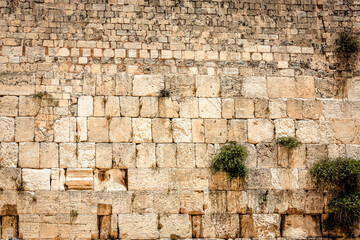 Close up of The Western Wall, Wailing Wall, often shortened to The Kotel is the most religious site...