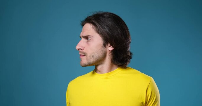 Man searching for someone far away over blue background