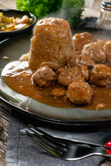 Minced meat balls in mushroom sauce.