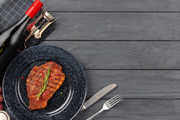 Grilled beef steak served on plate close up