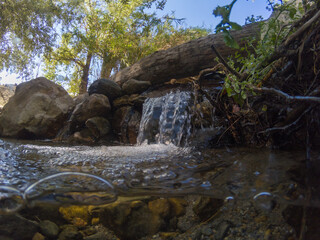 crystal clear water flowing down a river in southern Spain