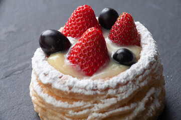 cake with berries and sugar