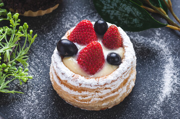 cake with berries and sugar