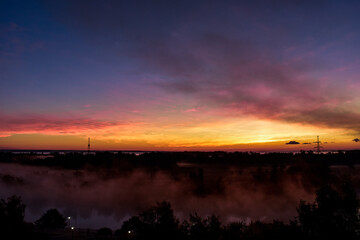 Obraz premium sunset over the river