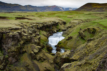 Iceland waterfall in the mountains