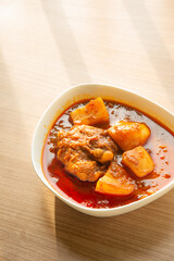 Thai Chicken massaman curry - Thai chicken and potato curry in coconut milk and herb eat with white rice