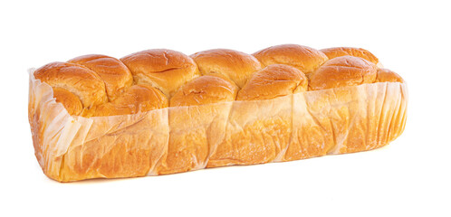 A braided brioche in its paper packaging