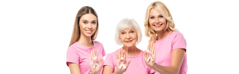 Website header of women looking at camera while showing pink ribbons isolated on white