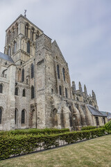 Fototapeta na wymiar Architectural fragments of Fecamp Abbey. Fecamp Abbey (Abbaye de la Trinite de Fecamp) founded in 658 for nuns. Fecamp, department of Seine-Maritime, Haute-Normandie region, France. 