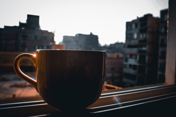 A yellow mug in the outdoor