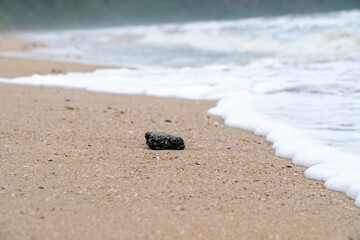 The  waves hit the shore at Ao Nang, Krabi, Thailand
