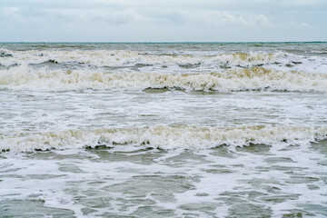 The  waves hit the shore at Ao Nang, Krabi, Thailand