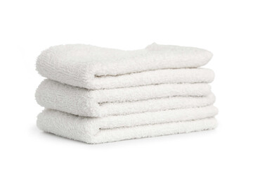 several white beach cotton towels folded on white background