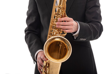 Obraz premium Saxophonist with a saxophone in his hands on a white background.
